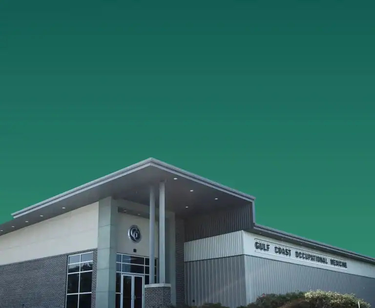 Gulf Coast Occupational Medicine building in a modern healthcare facility with clear signage located in the Gulf Coast region.