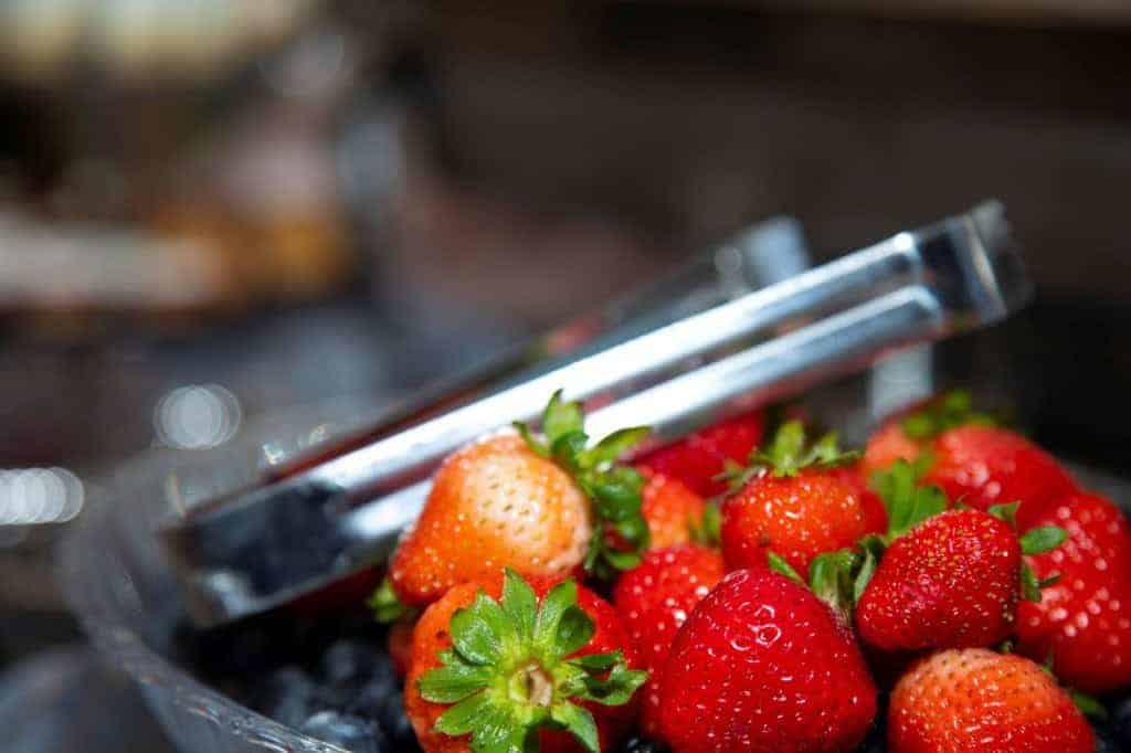 Sweet fresh strawberries at Gulf Coast gathering, perfect for summer snacks and local eats.